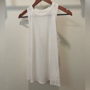 Lululemon white tank top, size 6. Open back or tie at the back! Never worn.
